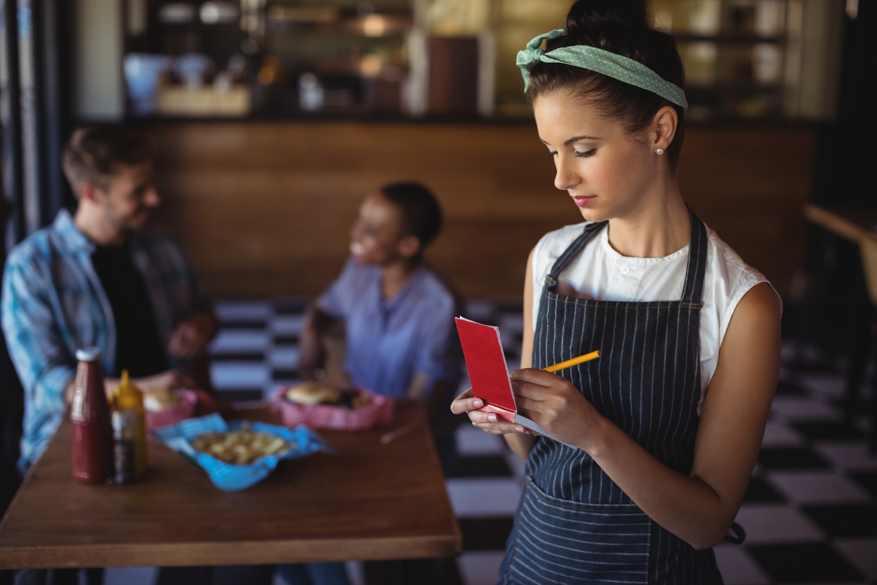 waitress-taking-order-at-restaurant-2025-04-05-09-25-17-utc-1