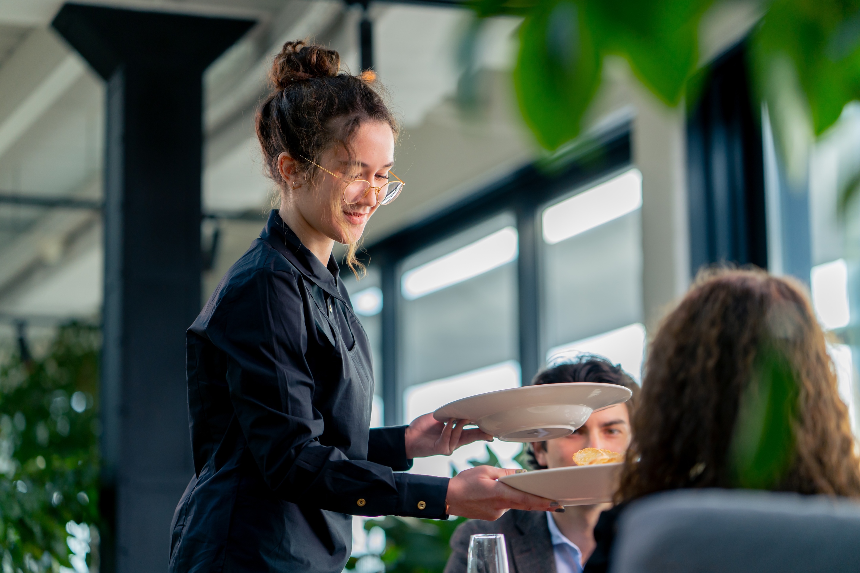 girl-waiter-serves-orders-to-guests-the-concept-of-2024-11-26-09-53-21-utc-1