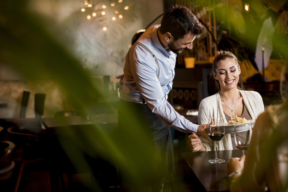 smiling-young-female-friends-at-a-restaurant-with-2025-02-24-09-29-14-utc-1-1-1-1